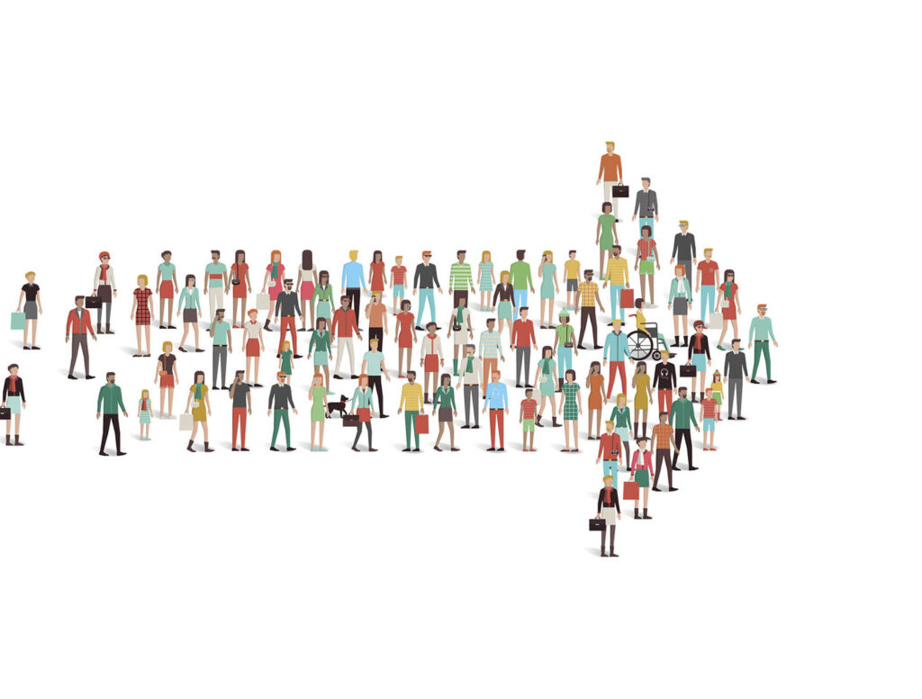 Crowd of people gathered in an arrow shape